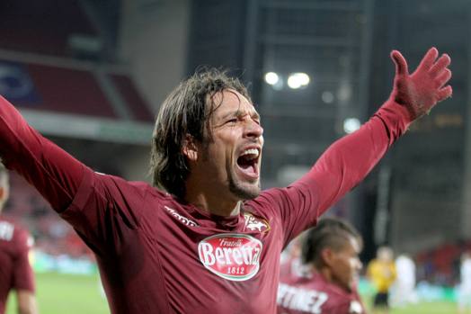 Amauri esulta a braccia aperte. LaPresse